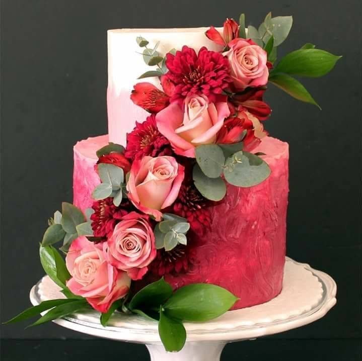Red floral cake with fresh flower styling